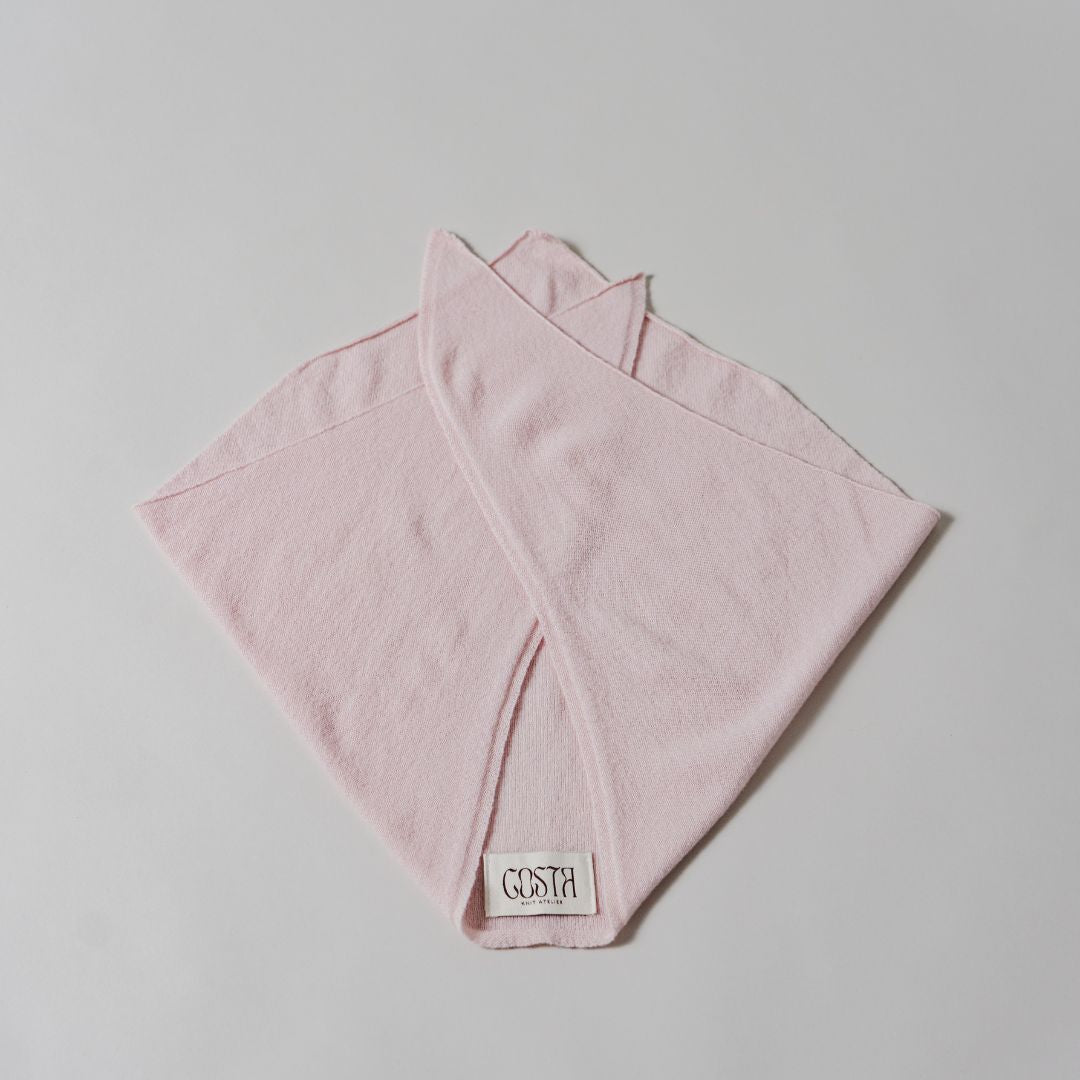 Costa Knit Atelier Triangle Scarf in premium cashmere, a versatile and contemporary handmade accessory available to shop now.