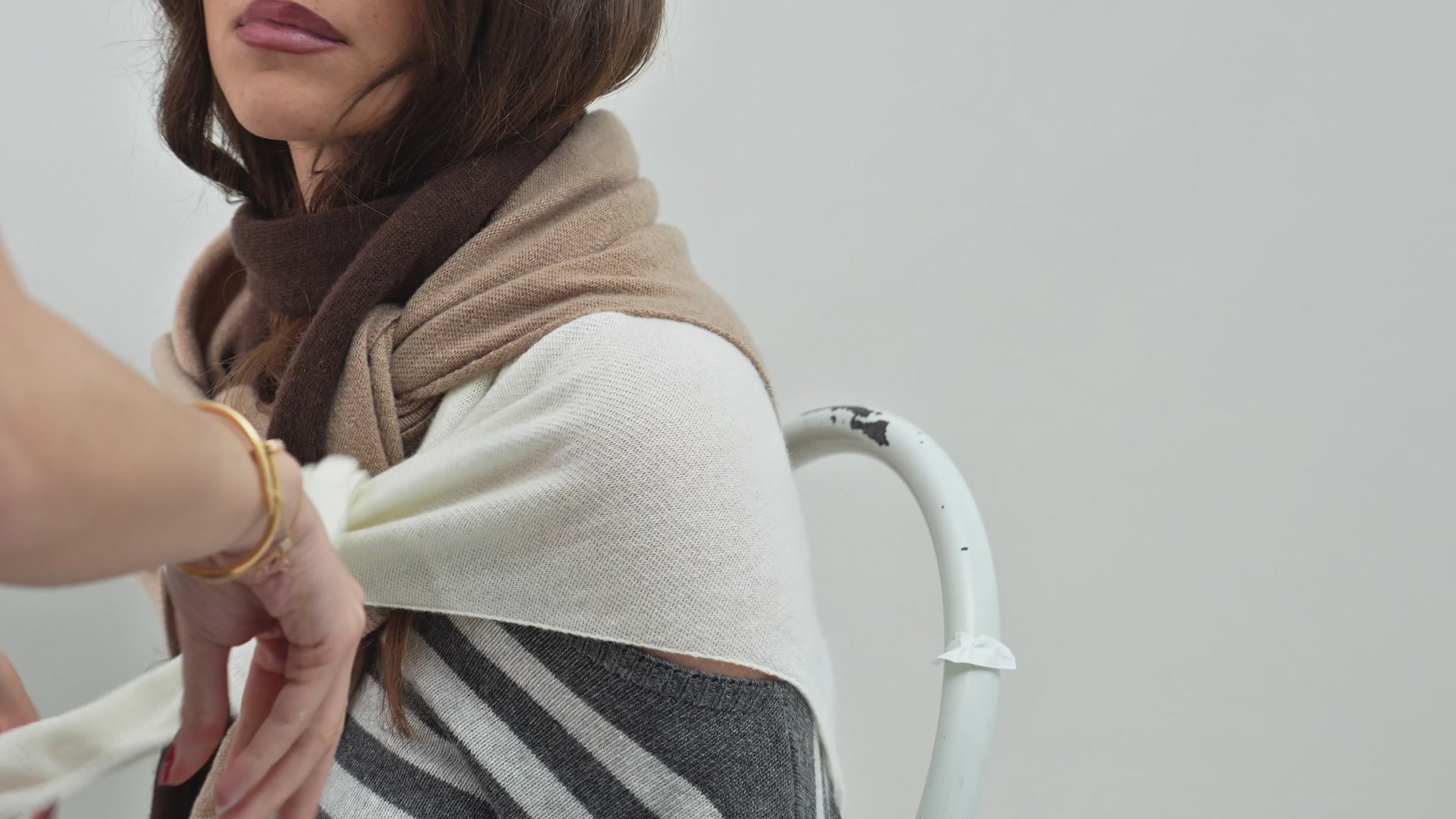 how-to-style-triangle-scarf-luxury-knitwear
Styling tutorial video demonstrating versatile ways to wear the Costa Knit Atelier Triangle Scarf, from classic neck wrap to sophisticated headpiece.